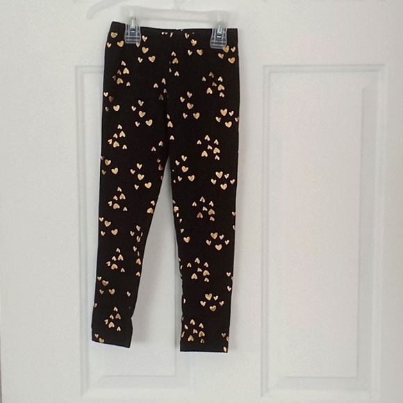 Girl's pants. Black with gold glitter hearts. Size S 6/6X. Cat & Jack - Picture 1 of 3